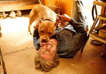 An image of Brad Pitt with his Dog