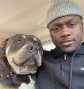 An image of A. J. Brown With his Dog